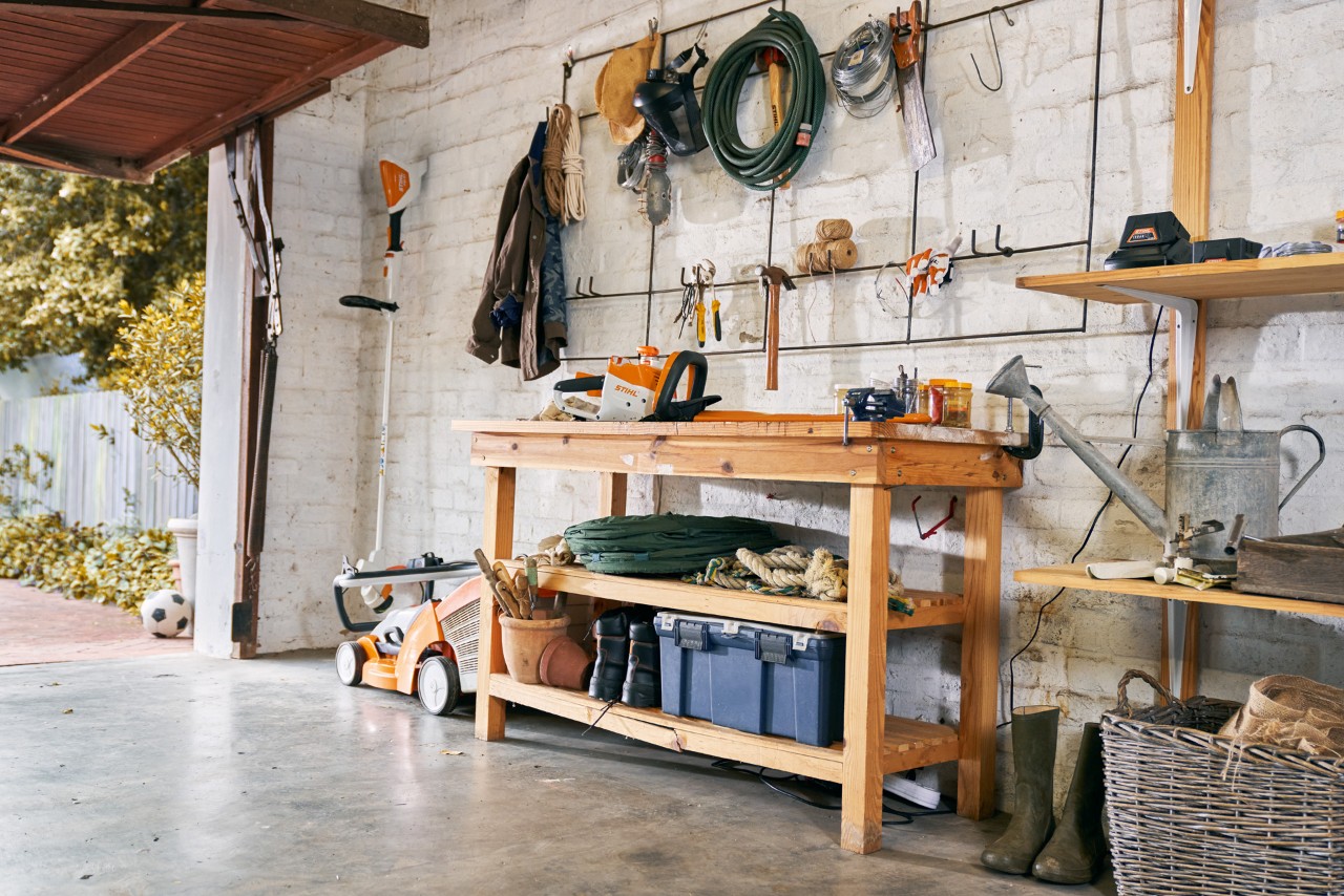 STIHL garden tools stored in a private garage.