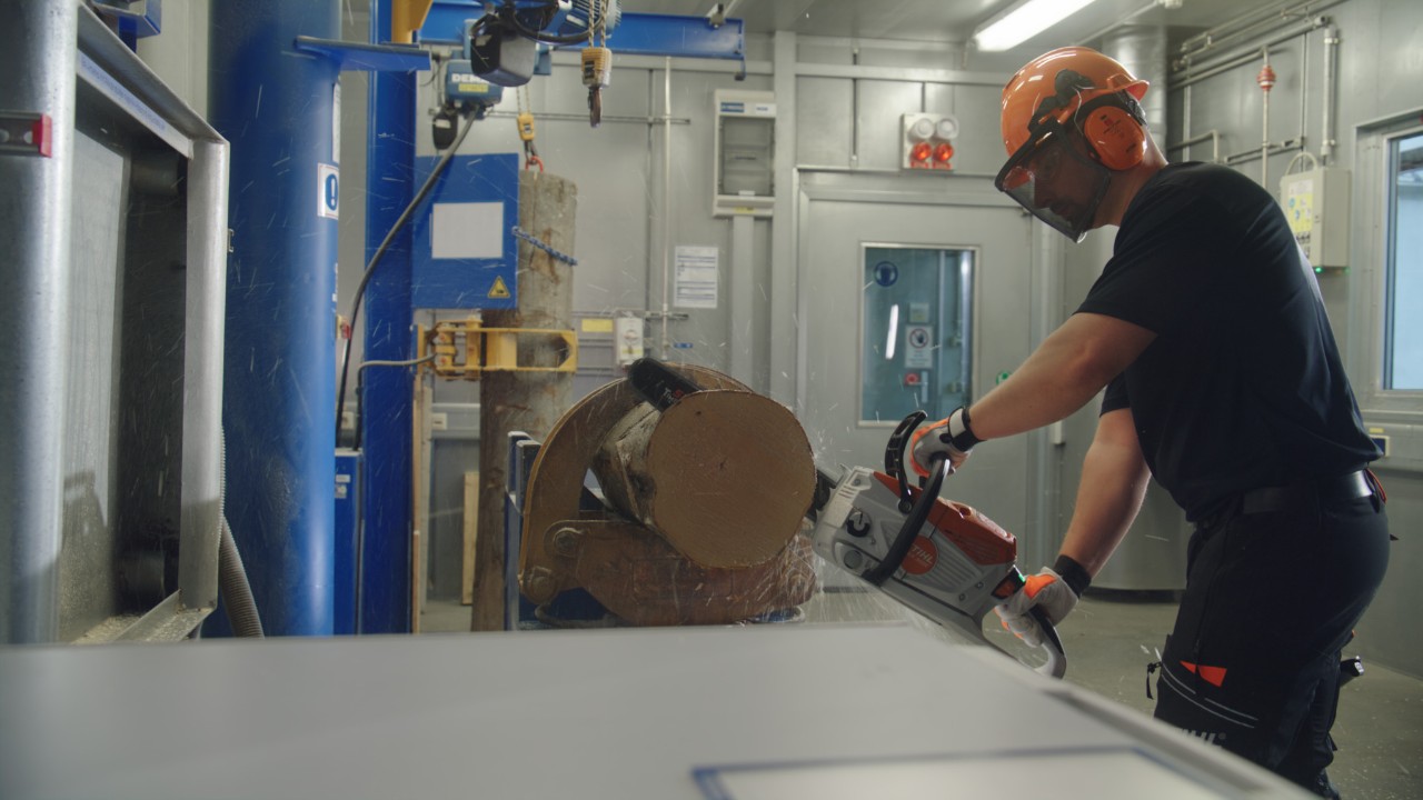 A STIHL chainsaw is tested in a sawing application